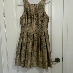Cocktail gold-black sleeveless dress